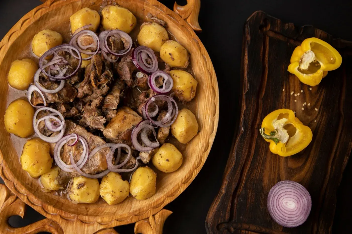 Traditional Romanian dish on a carved wooden platter