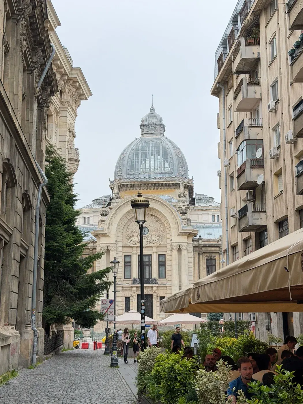 Bucharest Old Town street leading to the CEC Palace dome